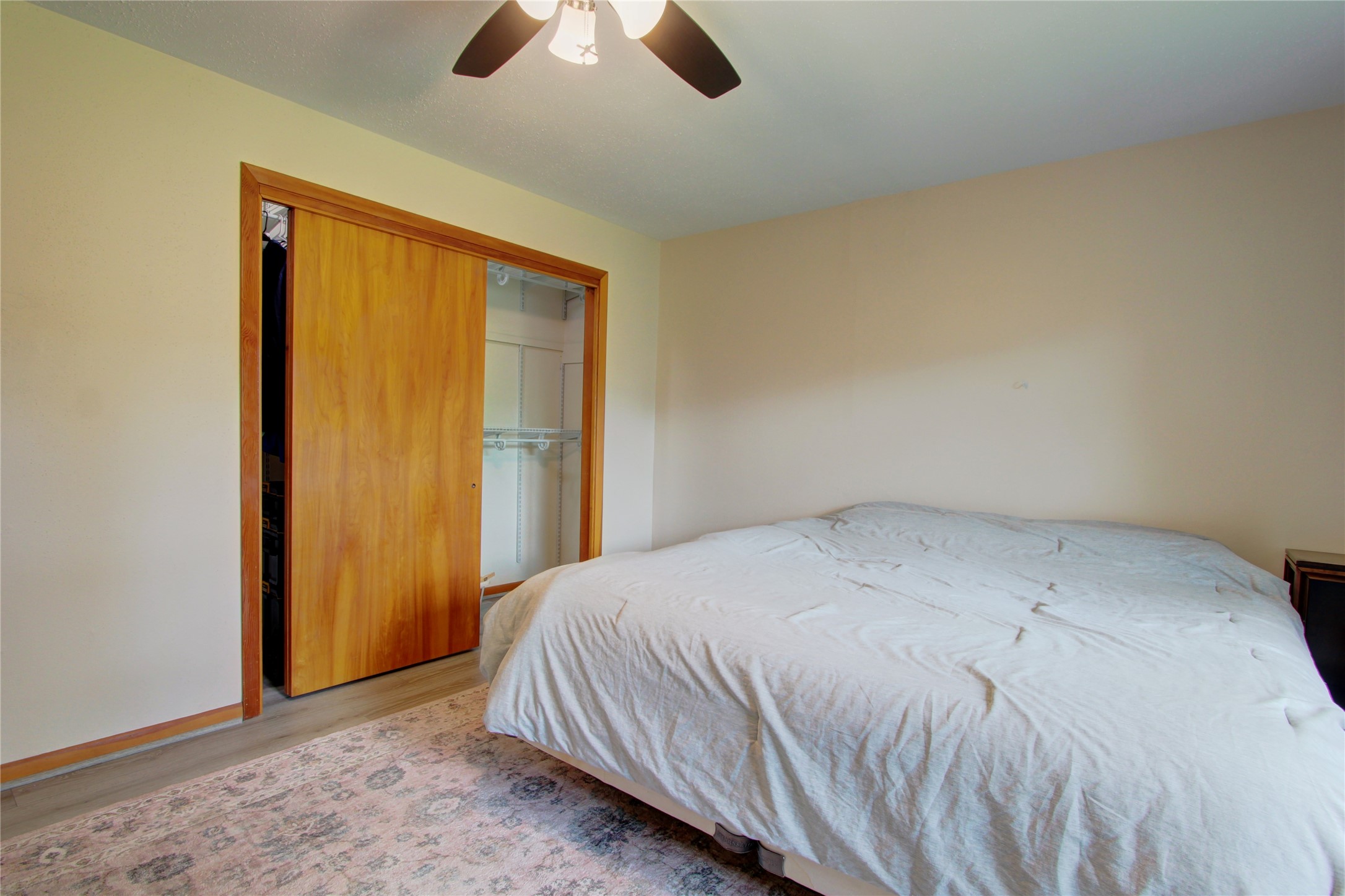 1904 Pine Street Liberty, TX 77575 - Photo 19 of 33 a bed sitting in a bedroom next to a window