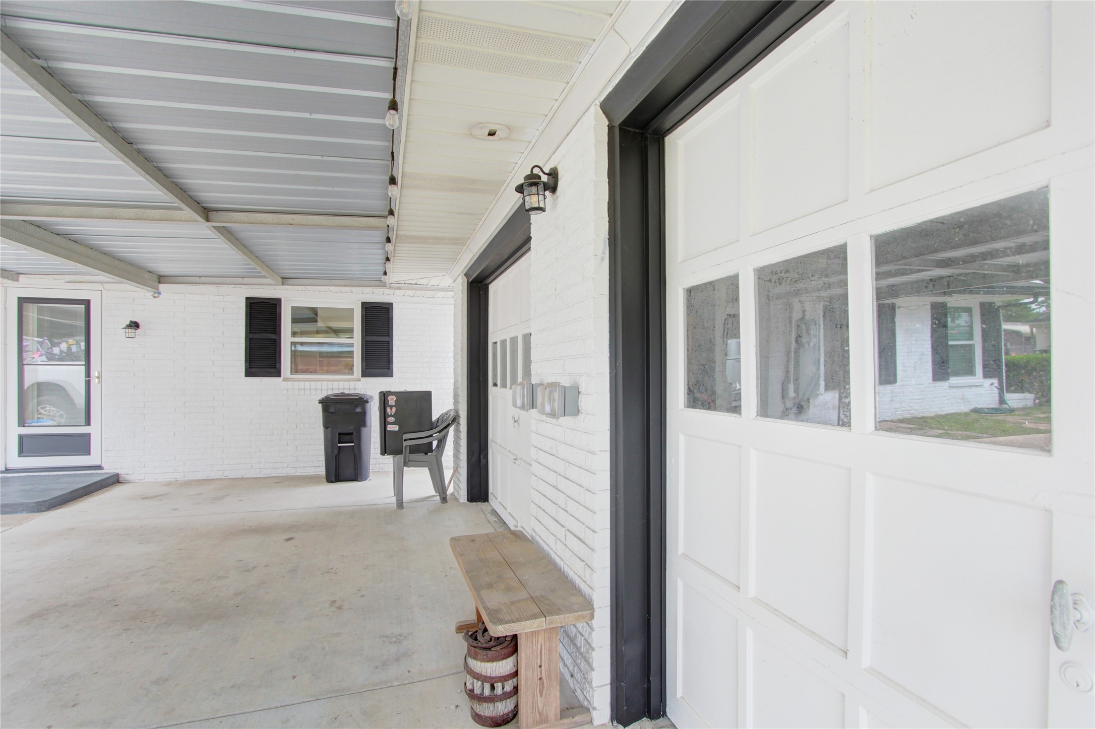 1904 Pine Street Liberty, TX 77575 - Photo 28 of 33 a view of a porch with a table and chairs