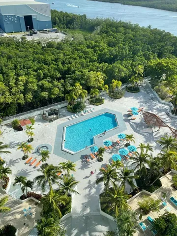 an aerial view of a houses with outdoor space