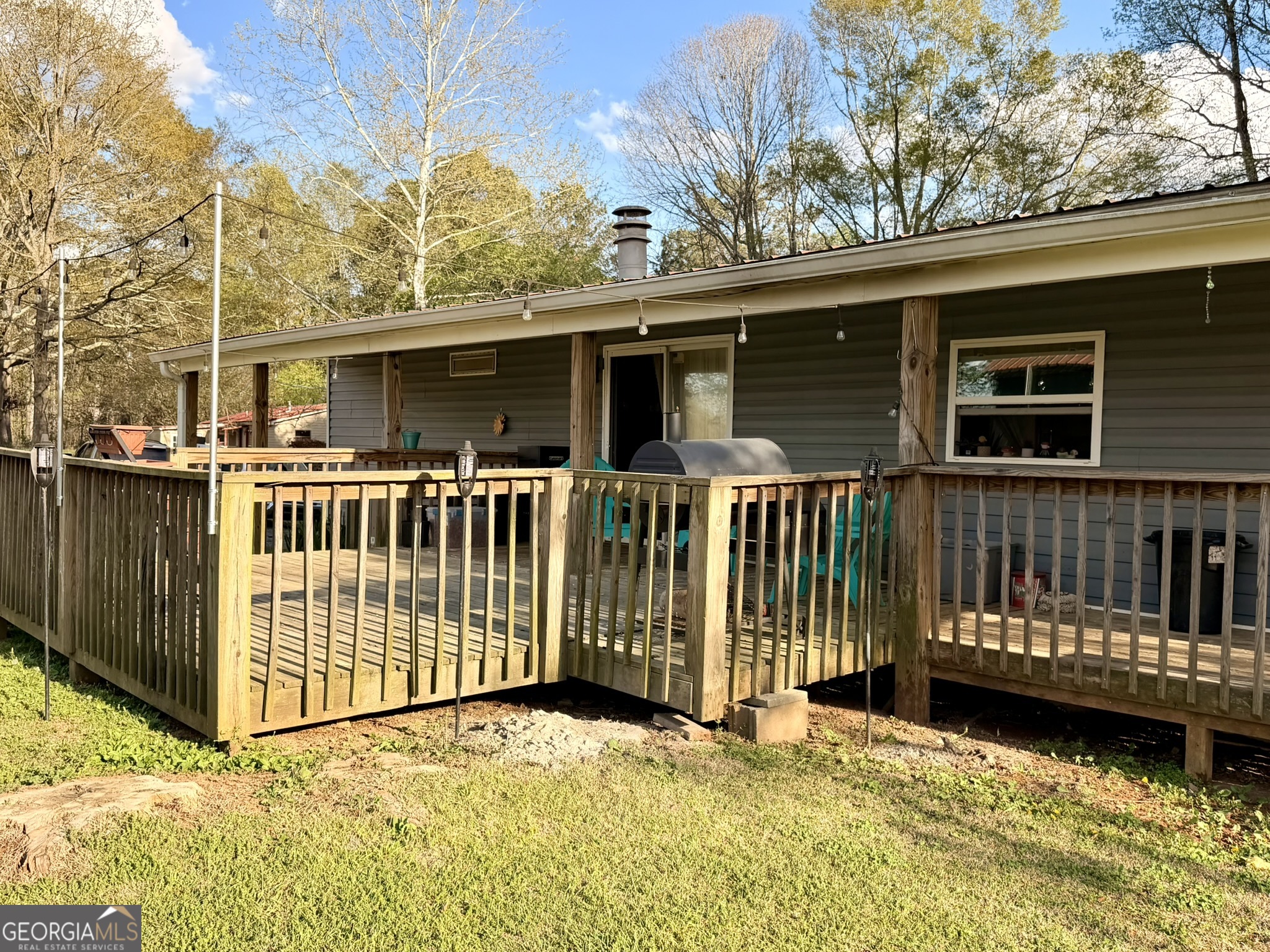 94 Country Place Temple, GA 30179 - Photo 12 of 36 a view of a house with wooden fence