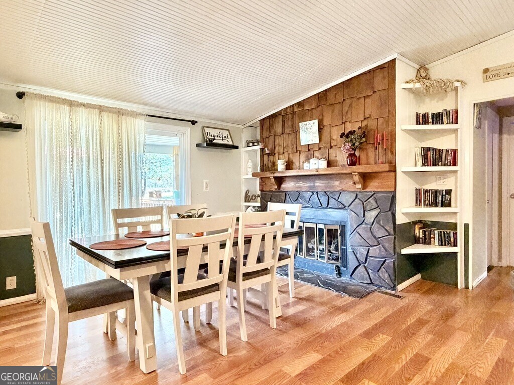 94 Country Place Temple, GA 30179 - Photo 21 of 36 a dining room with furniture and a floor to ceiling window