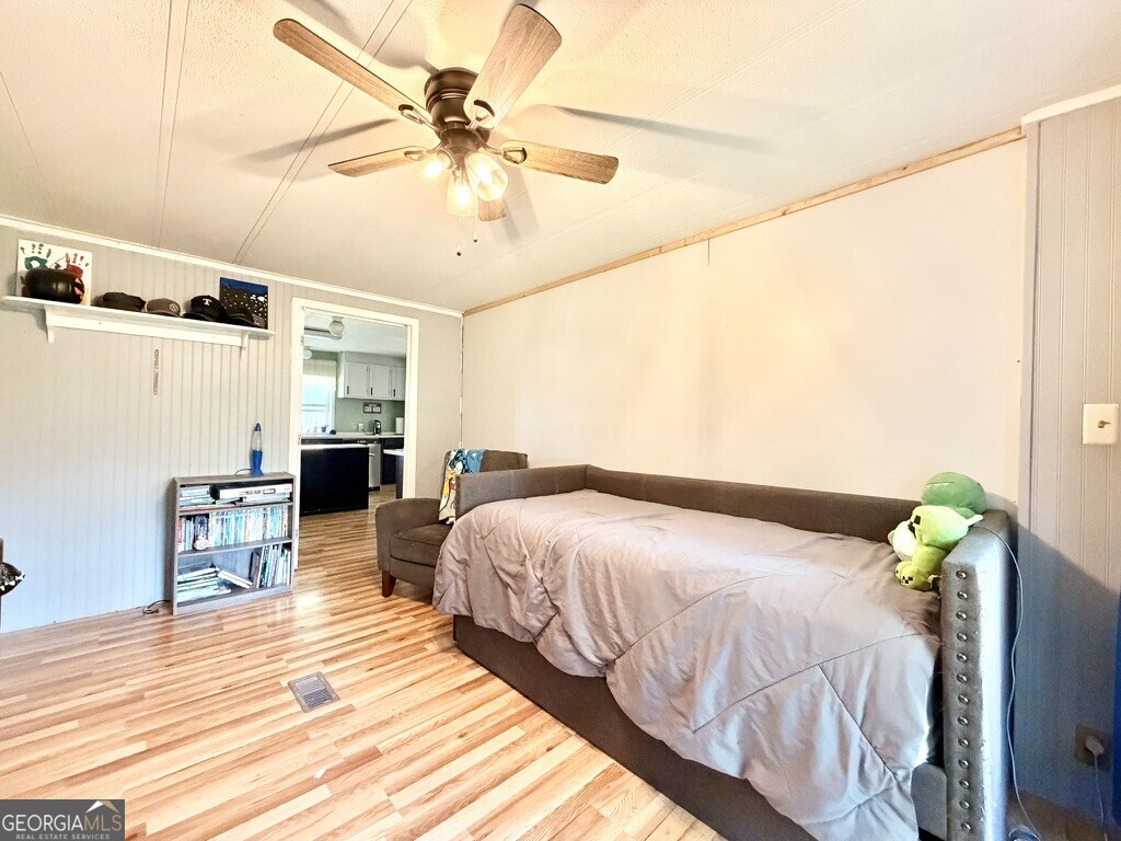 94 Country Place Temple, GA 30179 - Photo 31 of 36 a bedroom with a bed table and chairs
