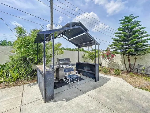a view of a terrace with sitting area