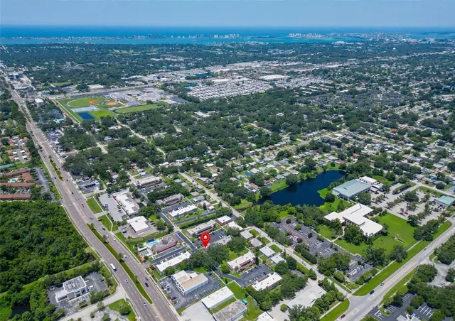 an aerial view of a house with a garden