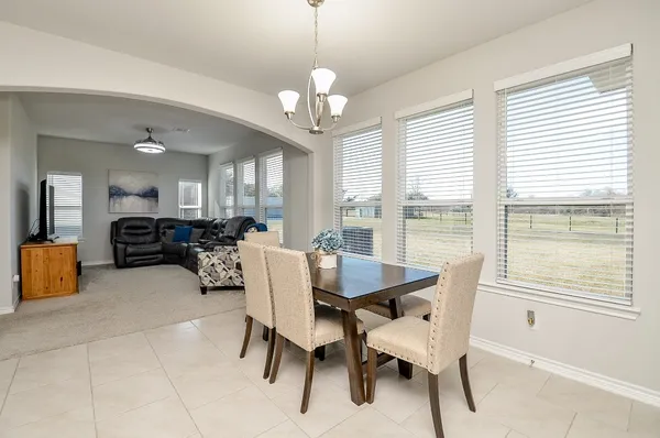a kitchen with kitchen island a sink stainless steel appliances and cabinets