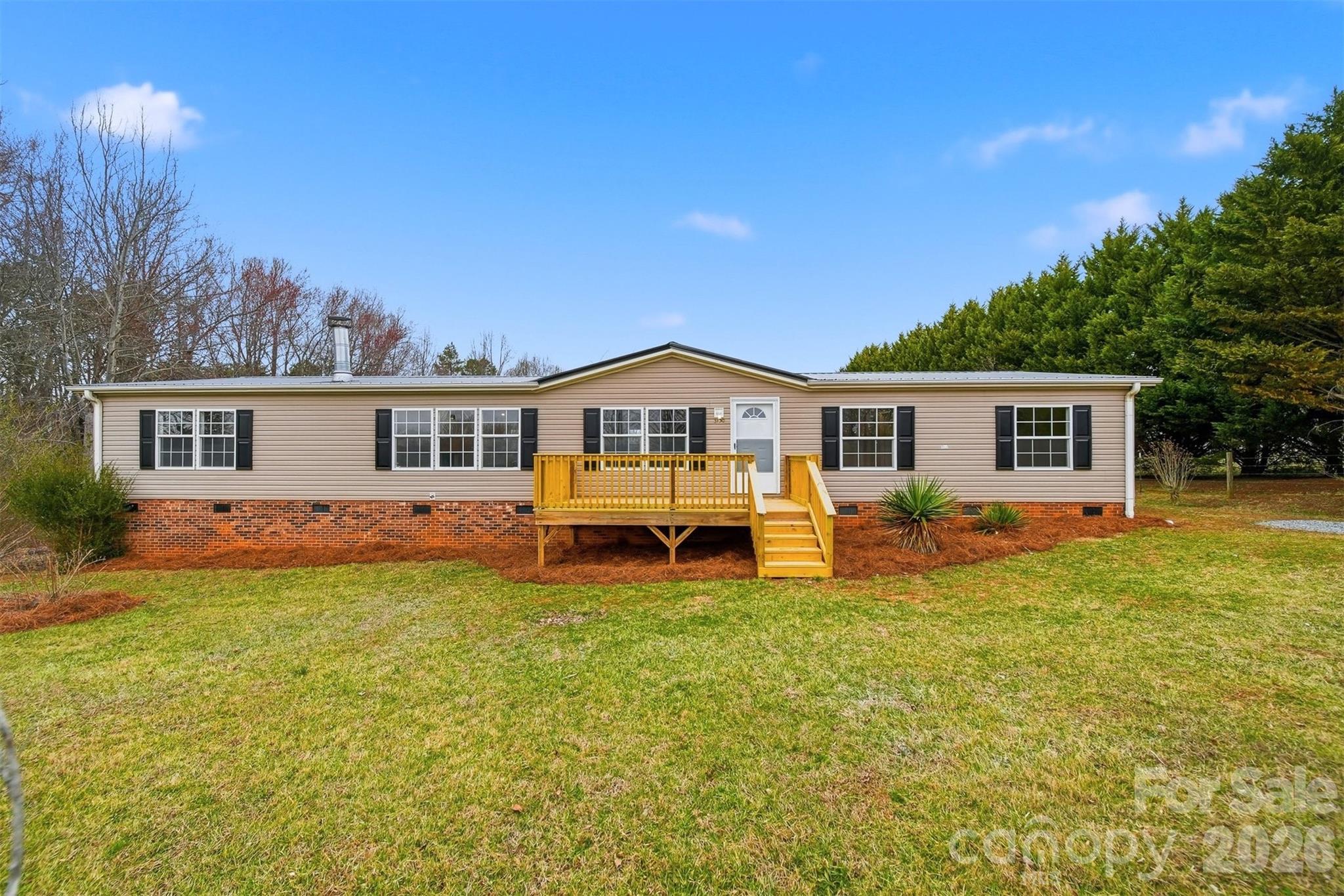 3150 Cranberry Road Boonville, NC 27011 - Photo 1 of 45 a view of a house with a patio