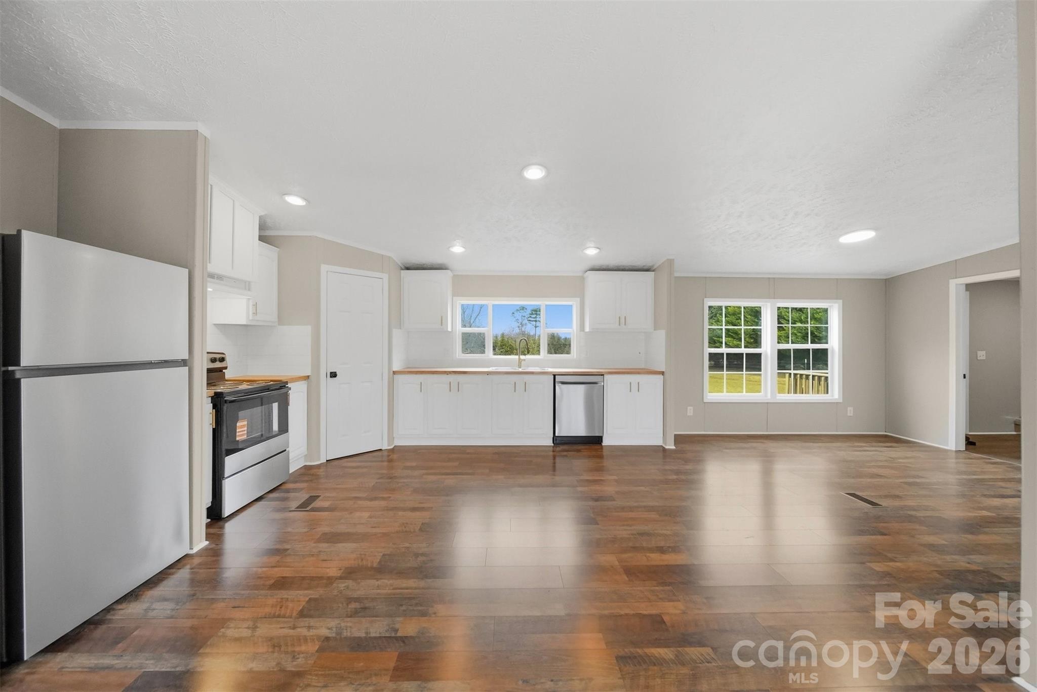 3150 Cranberry Road Boonville, NC 27011 - Photo 16 of 45 a view of kitchen with wooden floor and electronic appliances