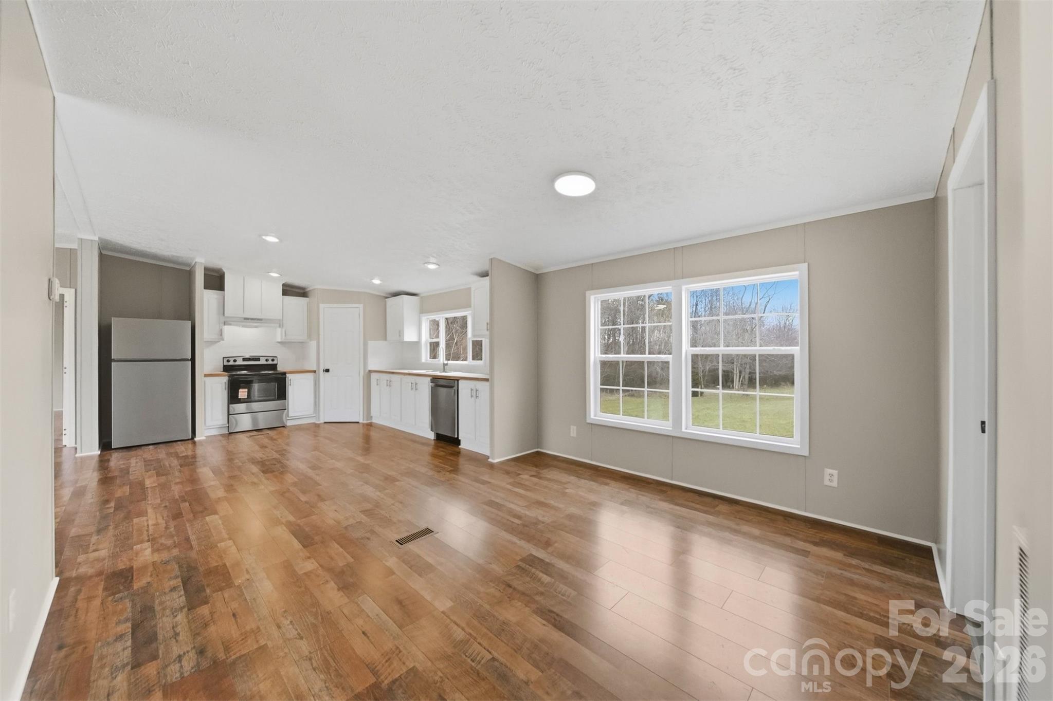 3150 Cranberry Road Boonville, NC 27011 - Photo 17 of 45 a view of an empty room with a window