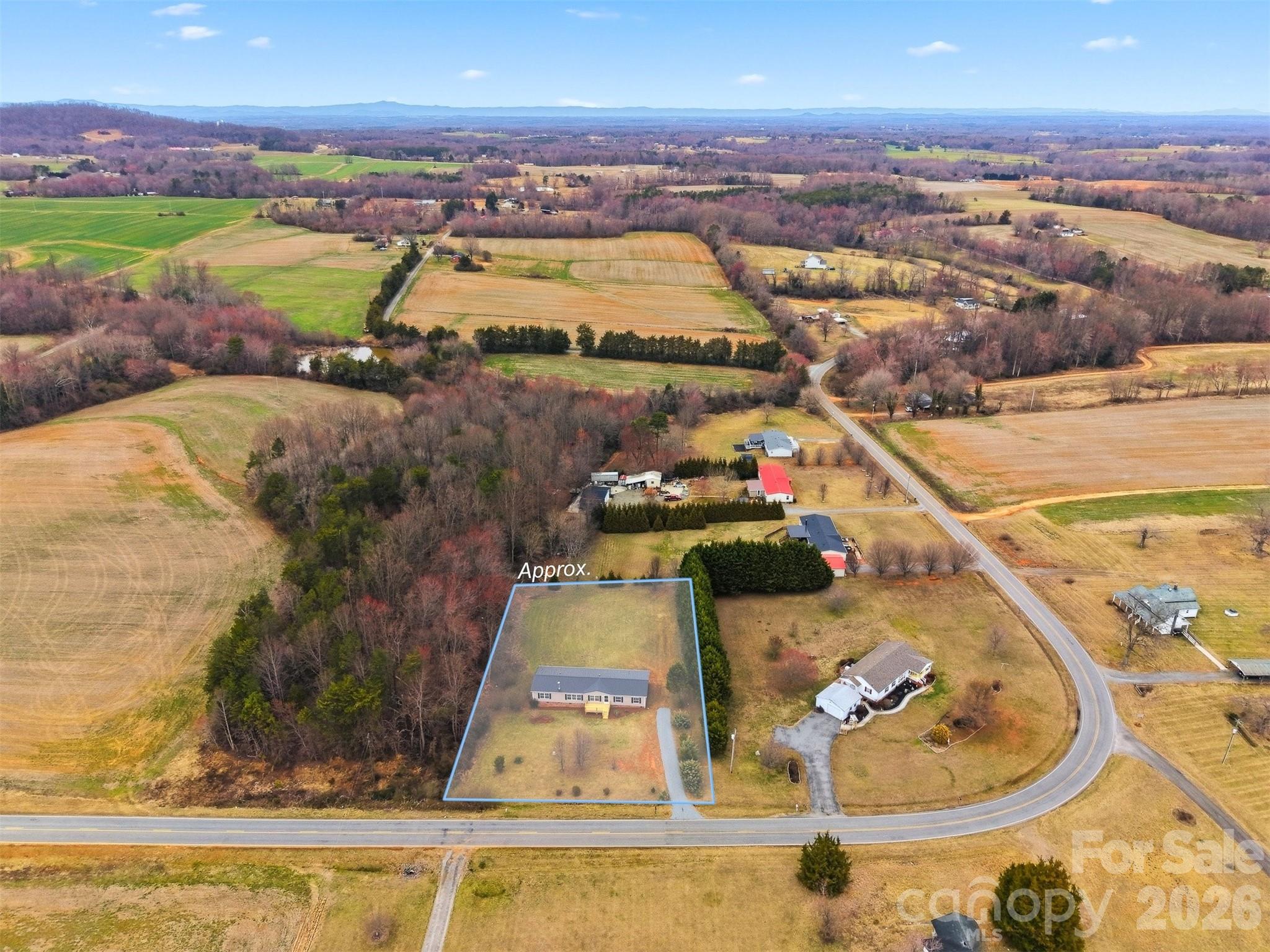 3150 Cranberry Road Boonville, NC 27011 - Photo 3 of 45 an aerial view of a house with a ocean view