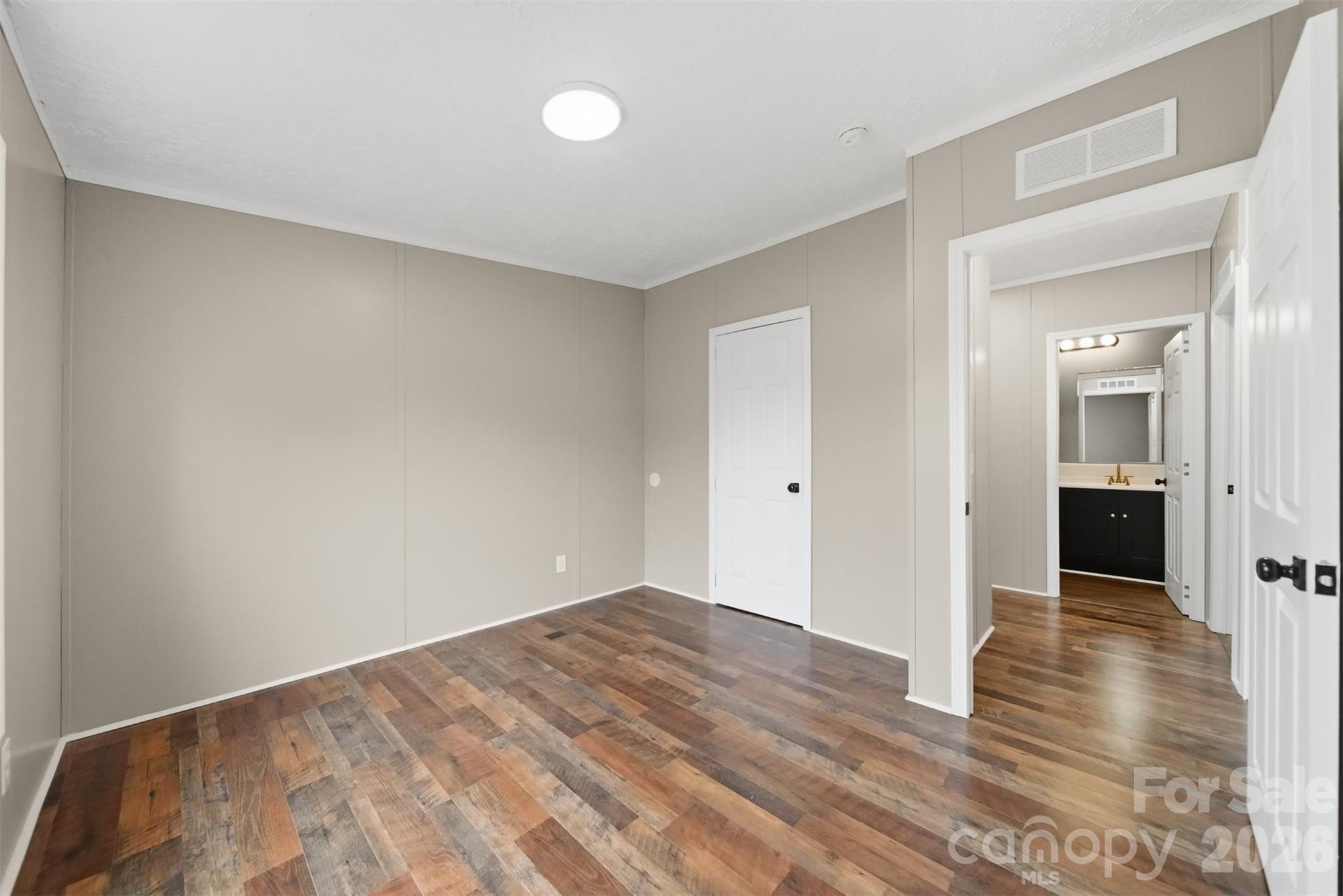 3150 Cranberry Road Boonville, NC 27011 - Photo 31 of 45 a view of a room with wooden floor and bathroom