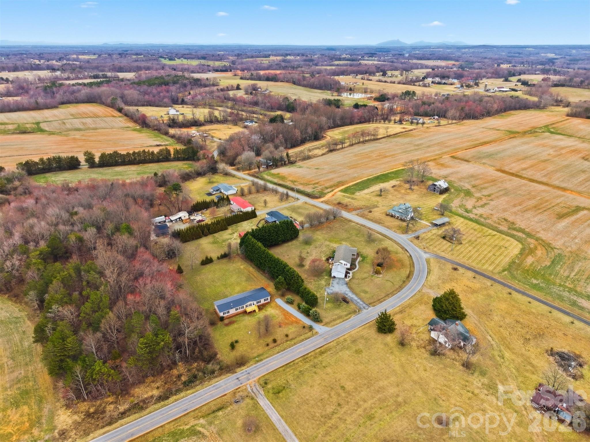 3150 Cranberry Road Boonville, NC 27011 - Photo 43 of 45 an aerial view of residential houses with outdoor space