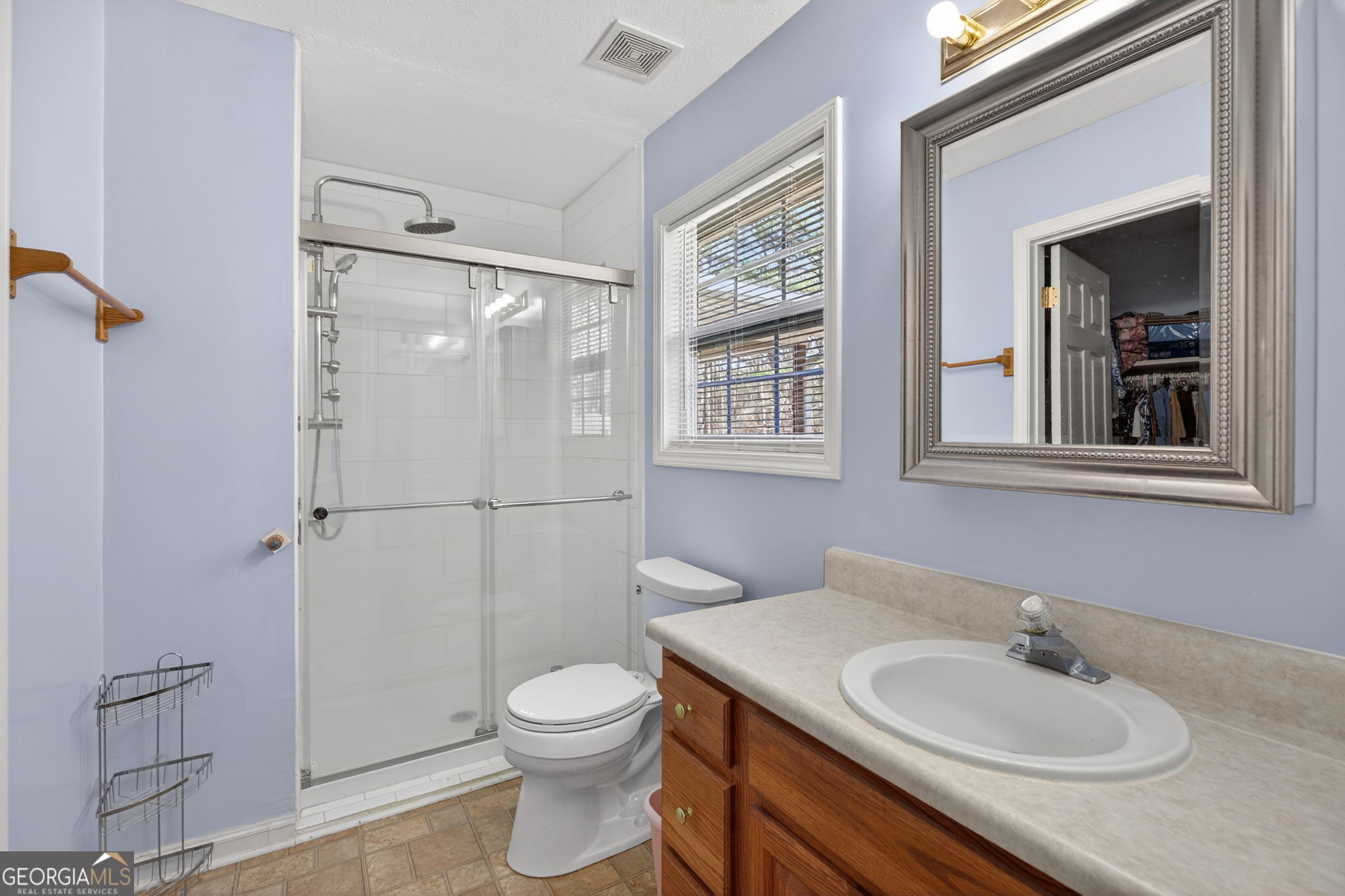 5010 Highway 27 Franklin, GA 30217 - Photo 16 of 39 a bathroom with a sink toilet and shower
