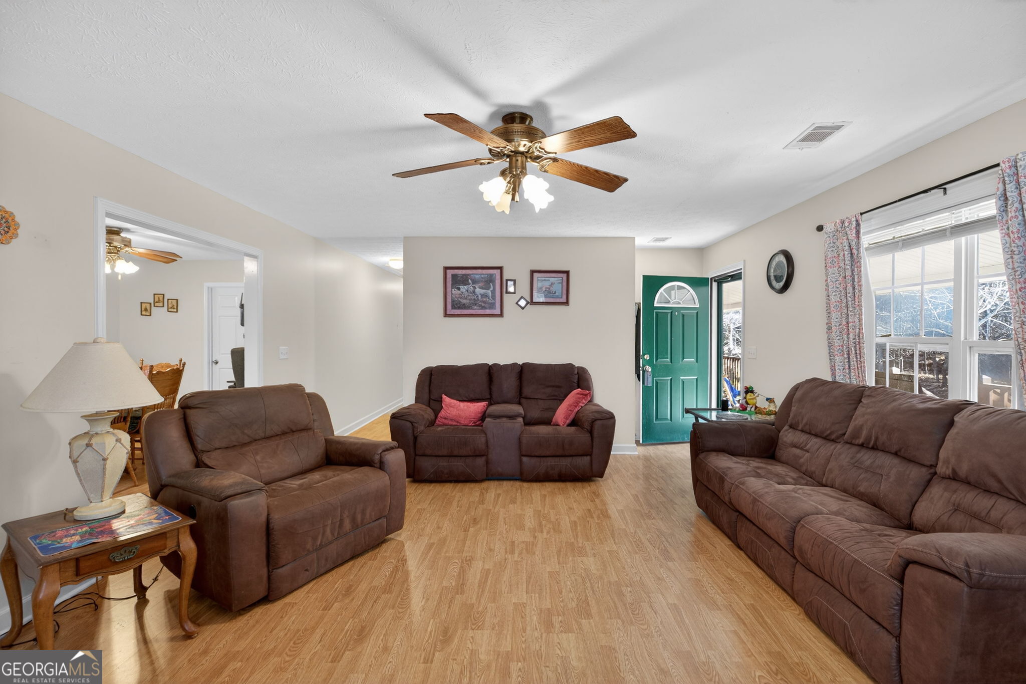 5010 Highway 27 Franklin, GA 30217 - Photo 5 of 39 a living room with furniture and a large window