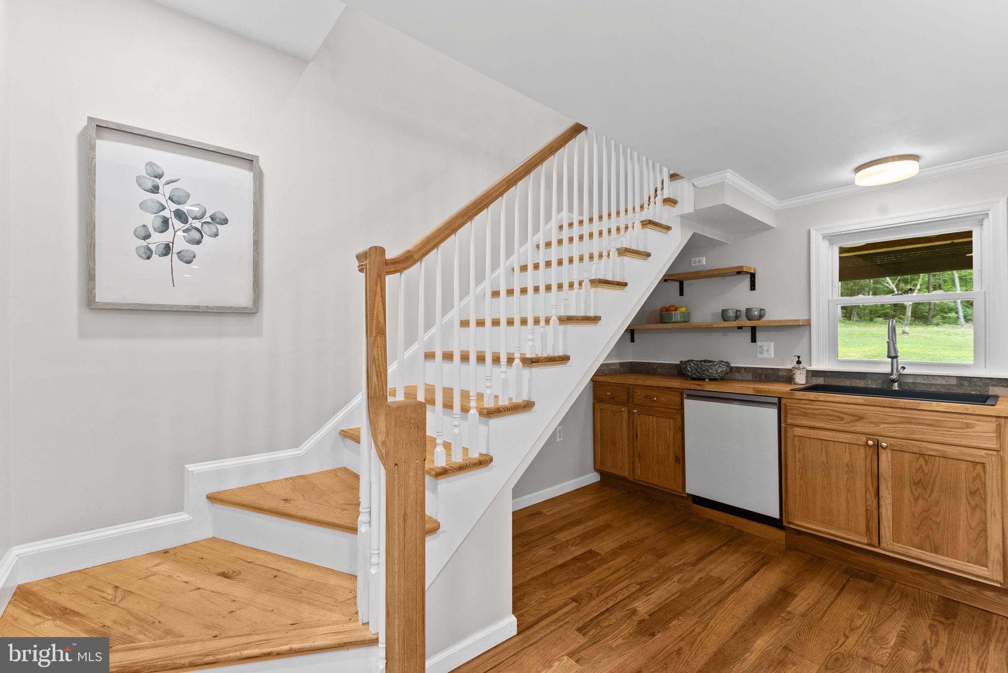 2303 West Hoover Road Haywood, VA 22722 - Photo 19 of 69 Custom Oak Handrail & Turned Balusters