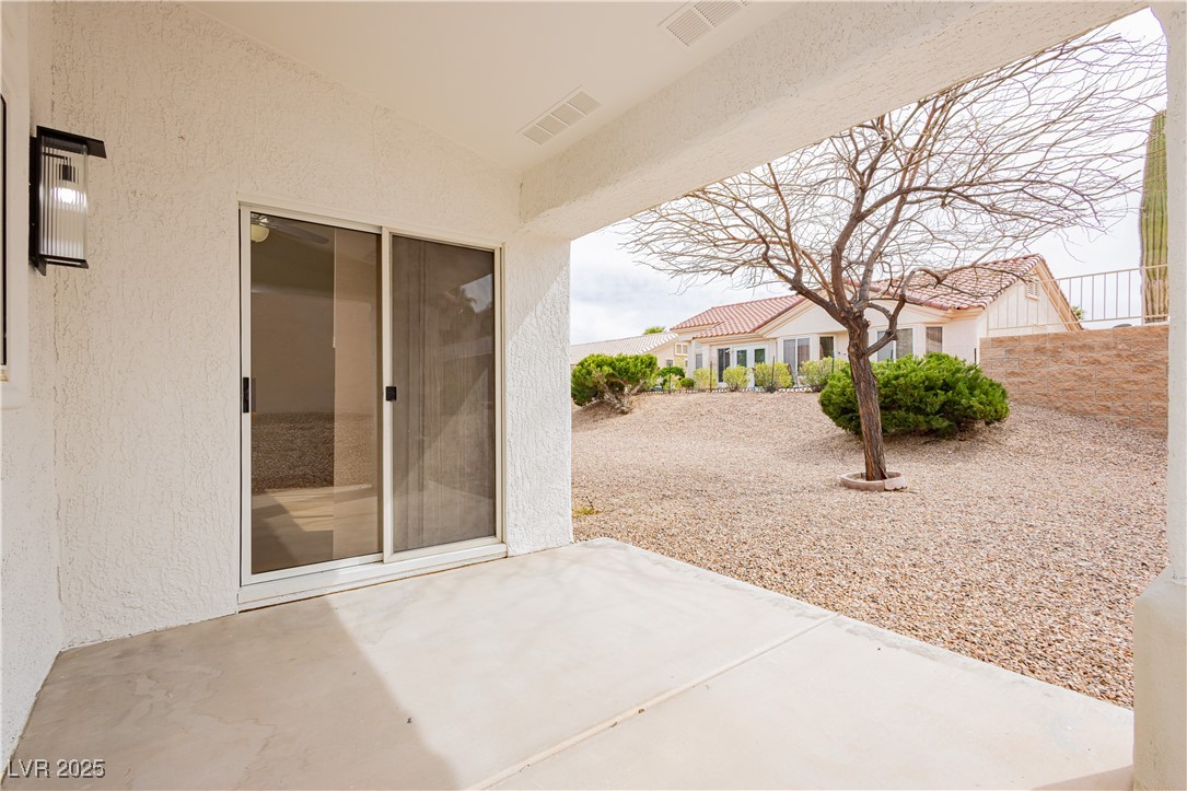 10309 Georgetown Place Las Vegas, NV 89134 - Photo 37 of 42 Exterior Covered Patio with entry to the family room