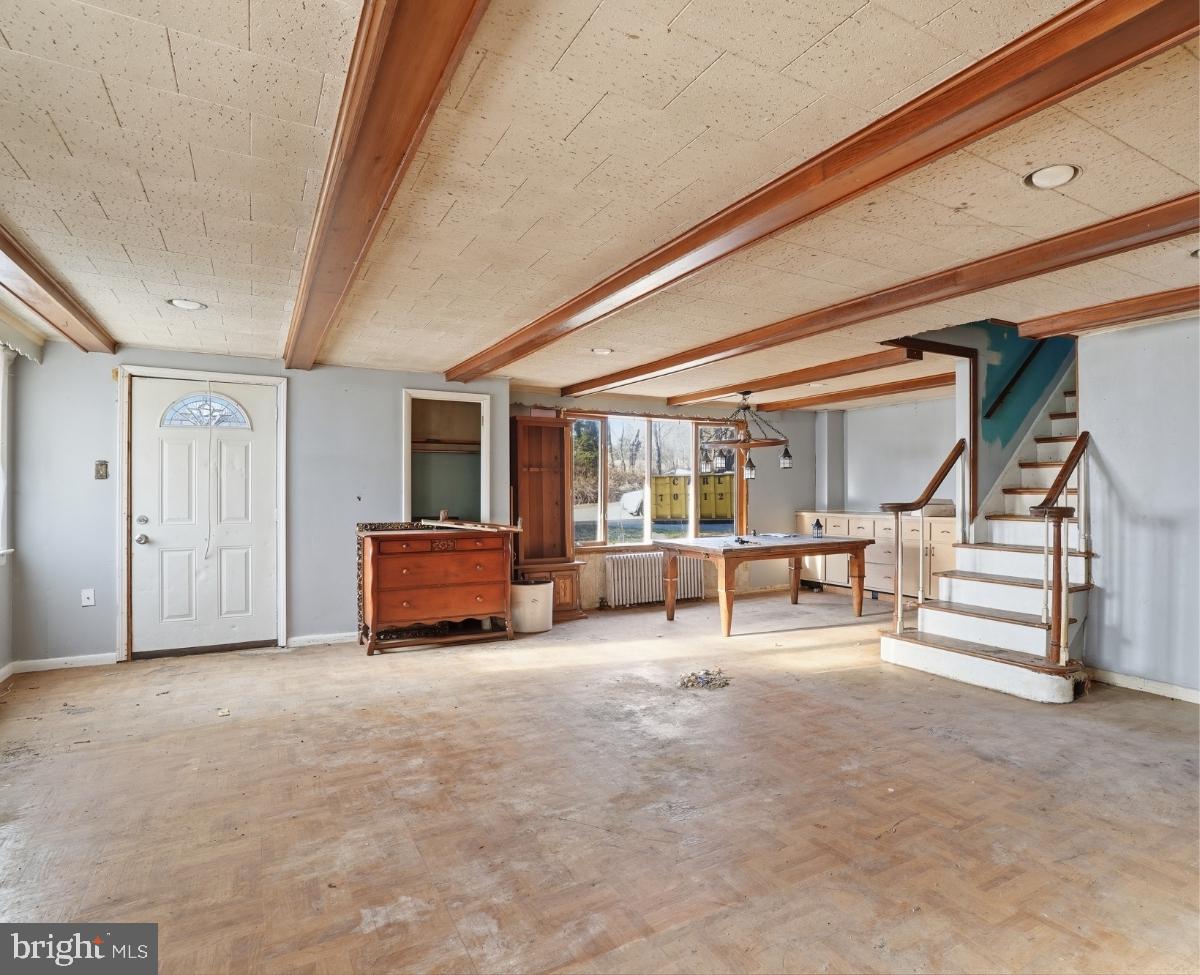 103 Ceramic Drive Newfoundland, PA 18445 - Photo 15 of 35 a living room with furniture and a flat screen tv