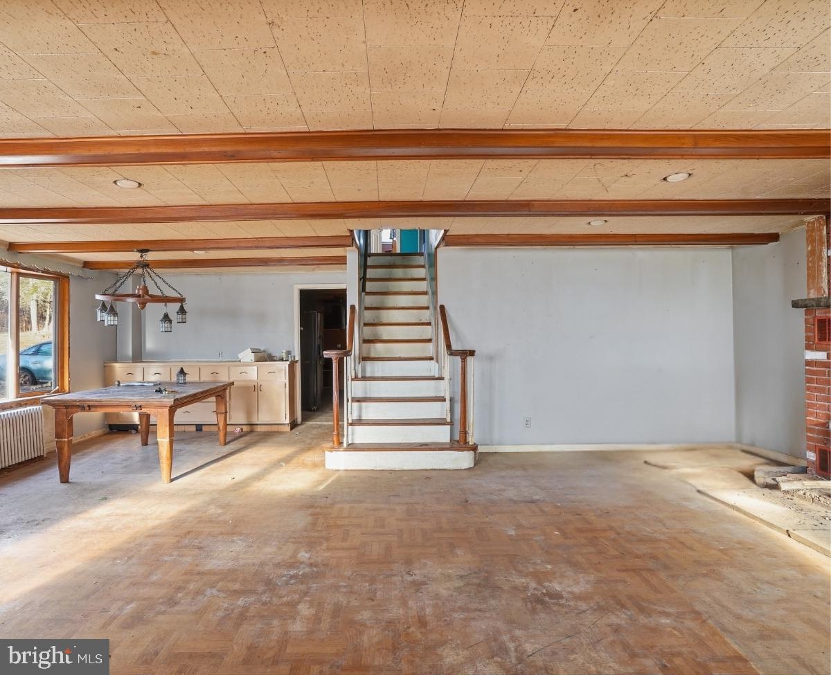 103 Ceramic Drive Newfoundland, PA 18445 - Photo 16 of 35 a view of a livingroom with entryway and furniture