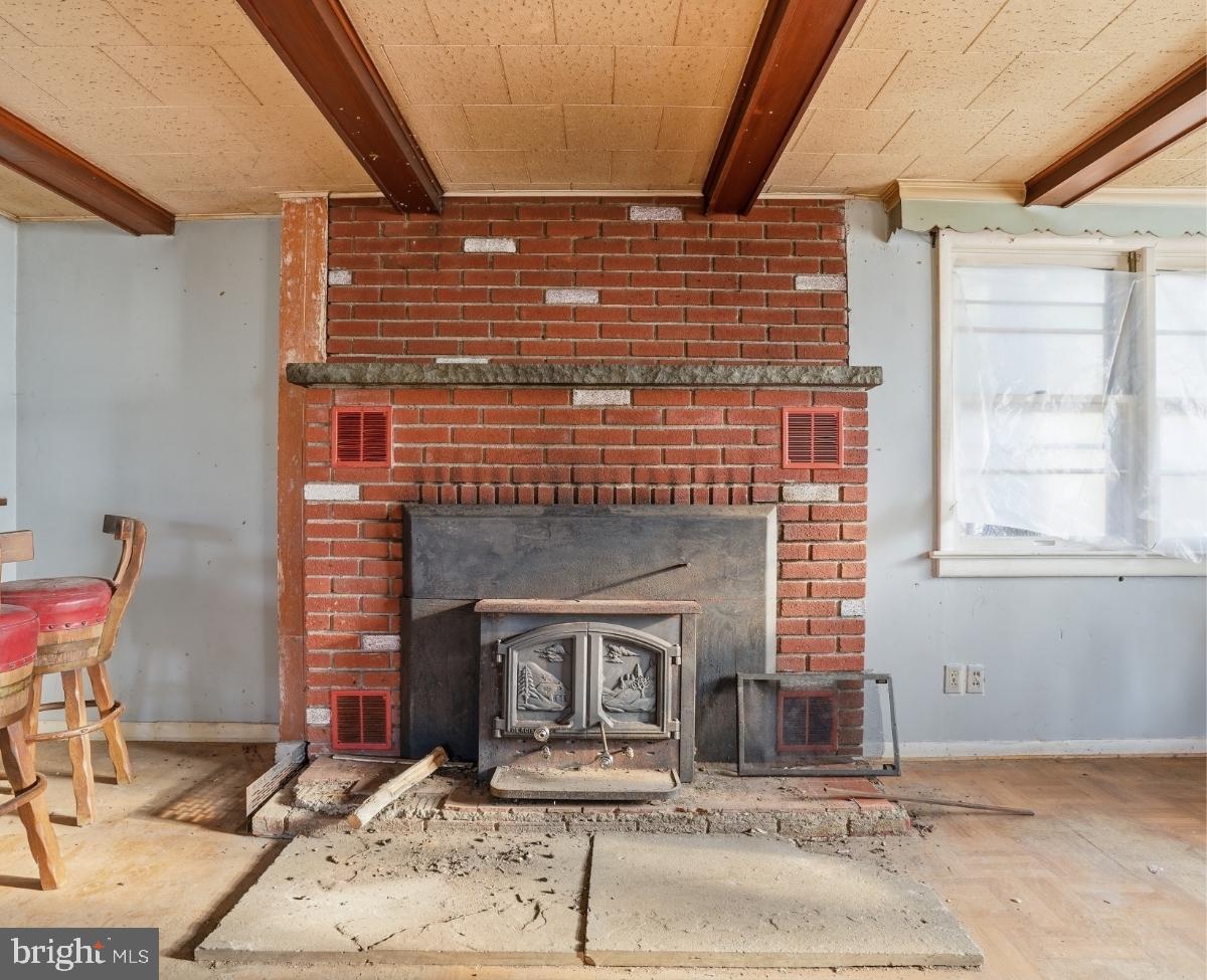 103 Ceramic Drive Newfoundland, PA 18445 - Photo 17 of 35 a building with table and chairs