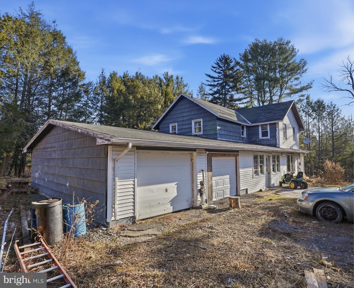 103 Ceramic Drive Newfoundland, PA 18445 - Photo 3 of 35 a front view of a house with a yard