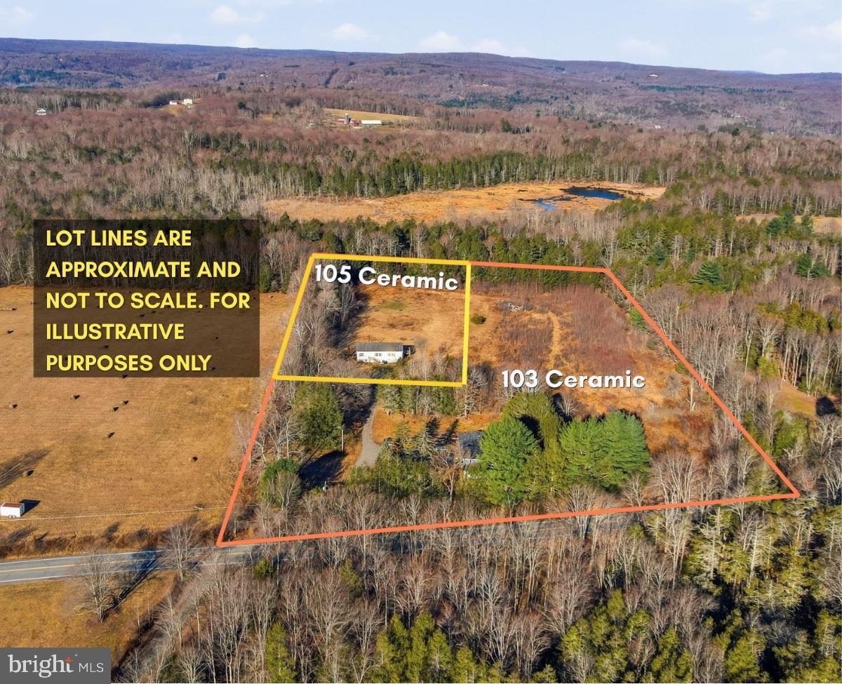 103 Ceramic Drive Newfoundland, PA 18445 - Photo 31 of 35 a view of a lake with a mountain in the background