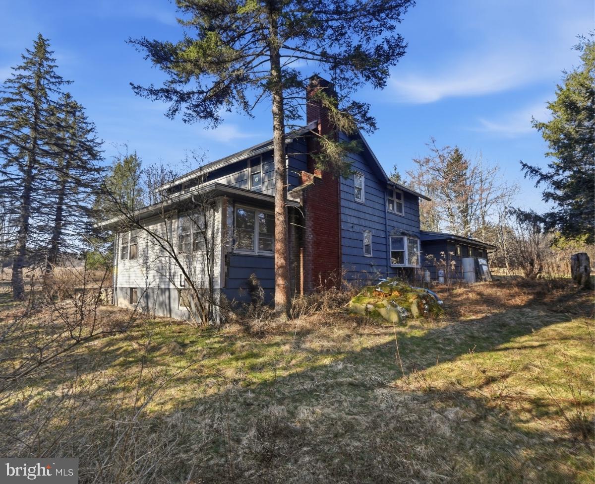 103 Ceramic Drive Newfoundland, PA 18445 - Photo 6 of 35 a view of a house with a yard covered in snow