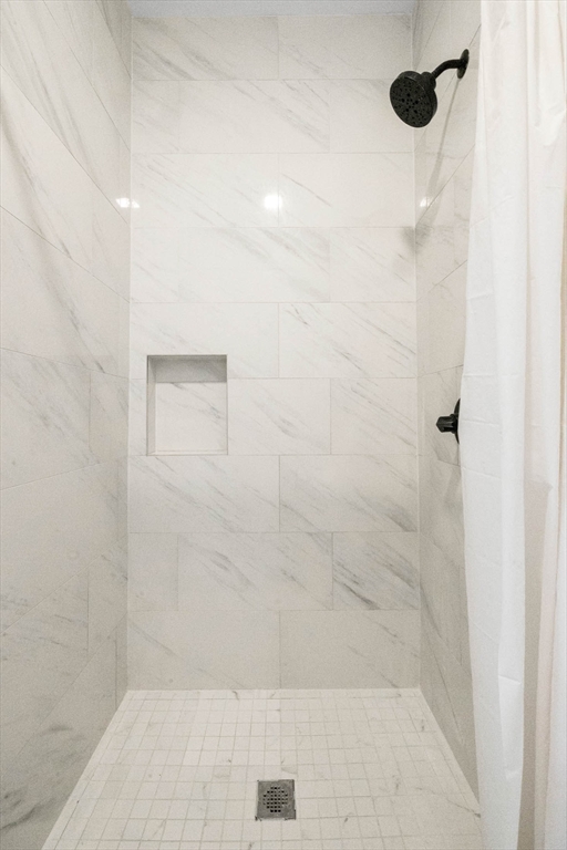 24 Howes Street, Unit 3 Boston, MA 02125 - Photo 8 of 15 a bathroom with a shower