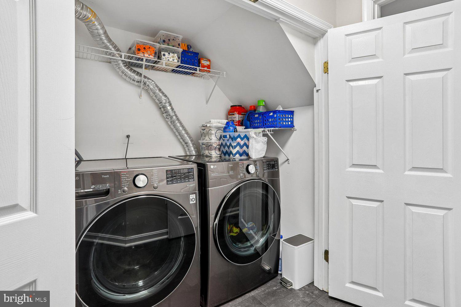 2530 Carrington Way Frederick, MD 21702 - Photo 31 of 38 a utility room with dryer and washer