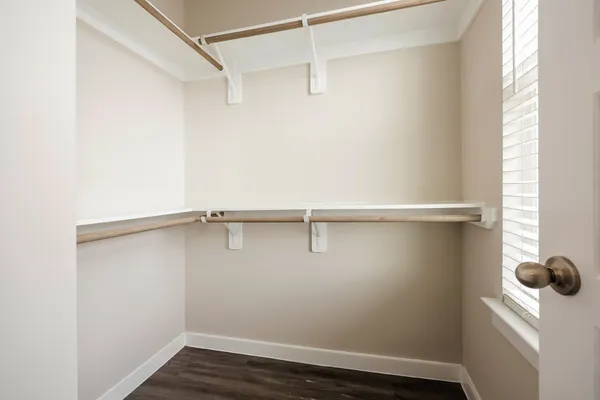 a bathroom with a shower and a sink
