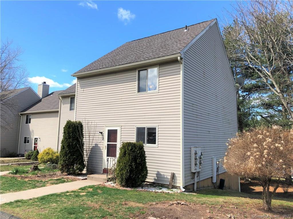 2 Mohawk Court, Unit 2 Cromwell, CT 06416 - Photo 1 of 1 a view of a house with a yard