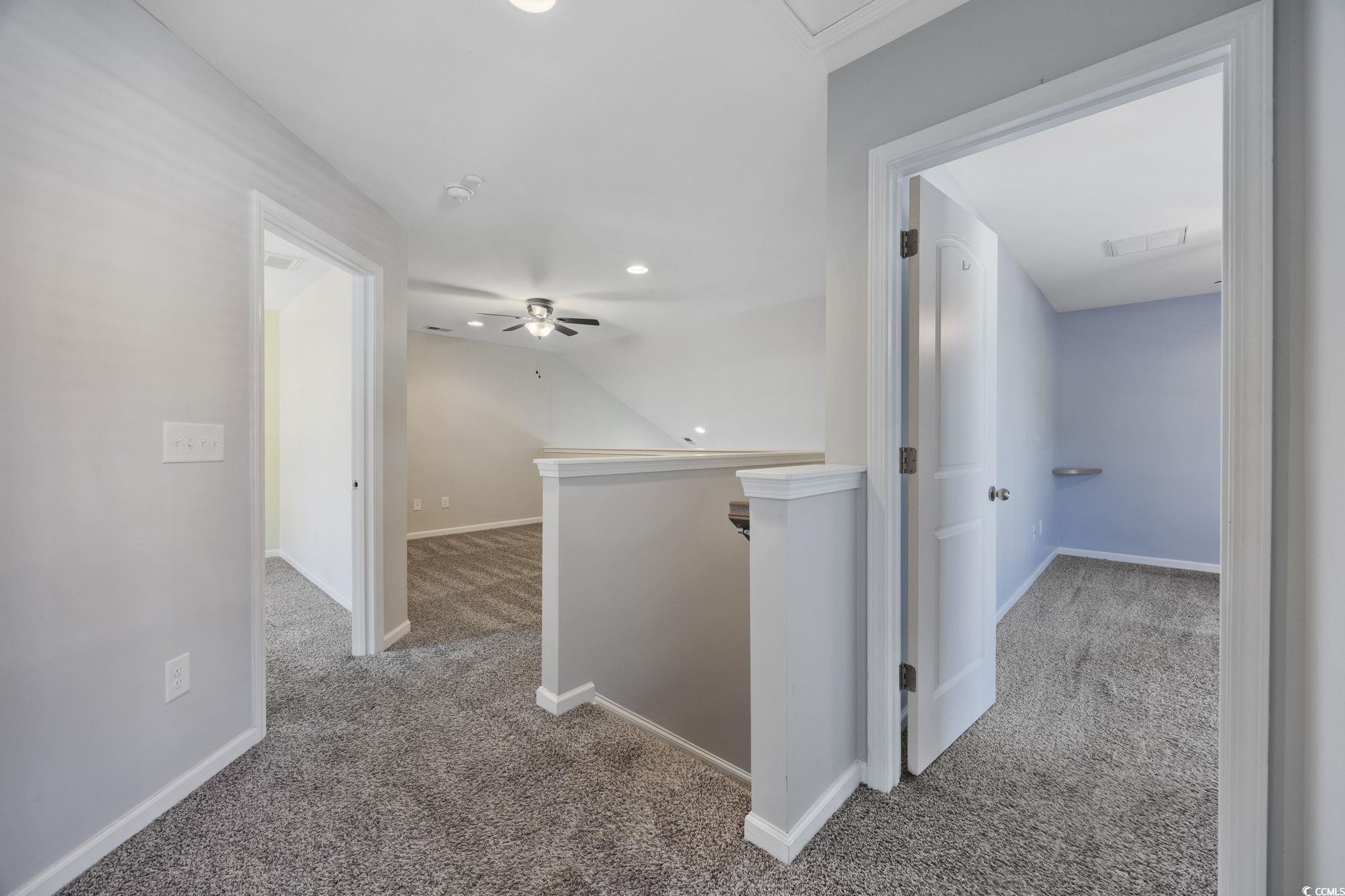 115 Machrie Loop, Unit D Myrtle Beach, SC 29588 - Photo 21 of 40 Hallway featuring an upstairs landing, carpet, and recessed lighting