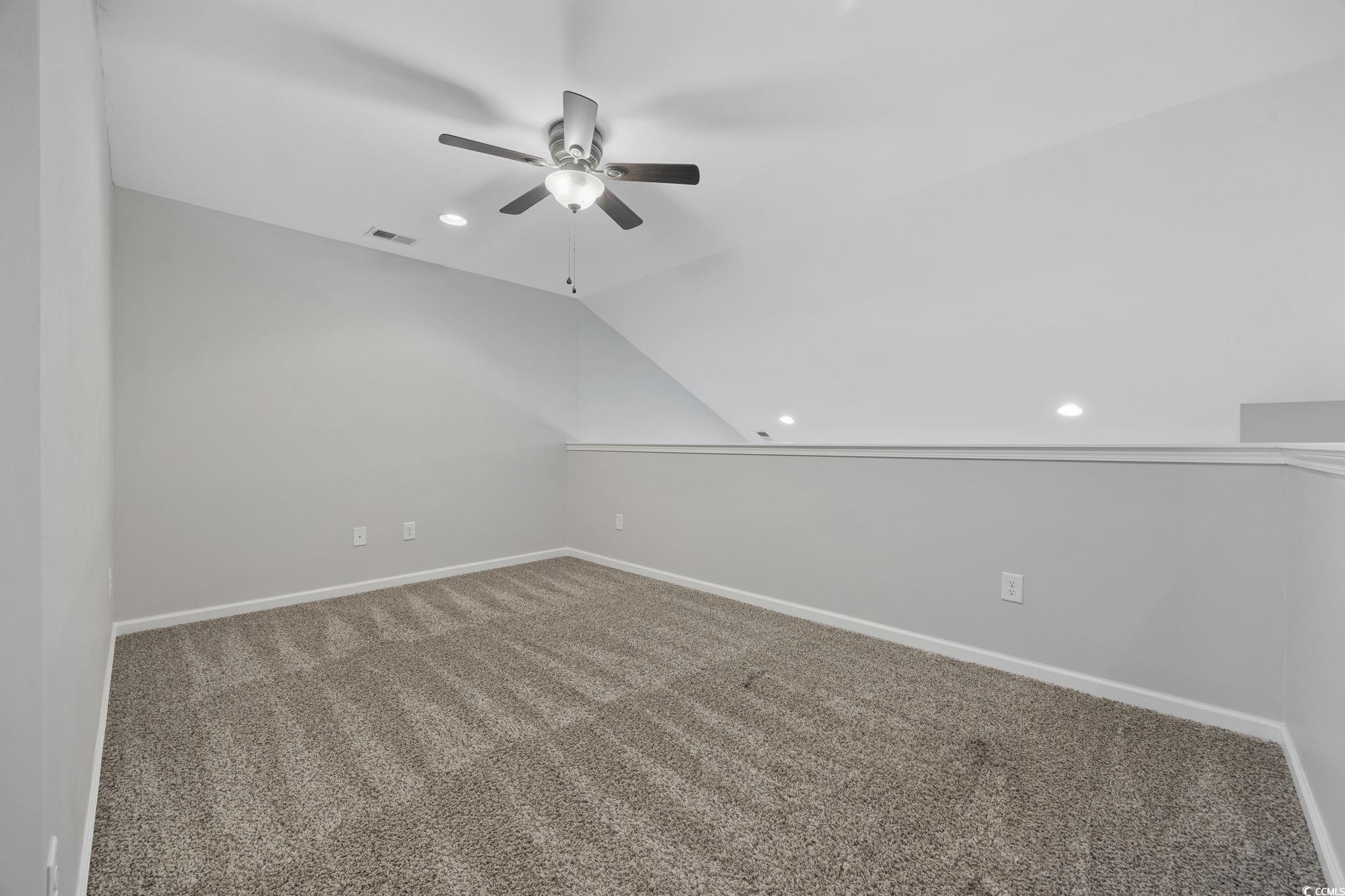 115 Machrie Loop, Unit D Myrtle Beach, SC 29588 - Photo 22 of 40 Additional living space featuring recessed lighting, carpet floors, vaulted ceiling, and ceiling fan