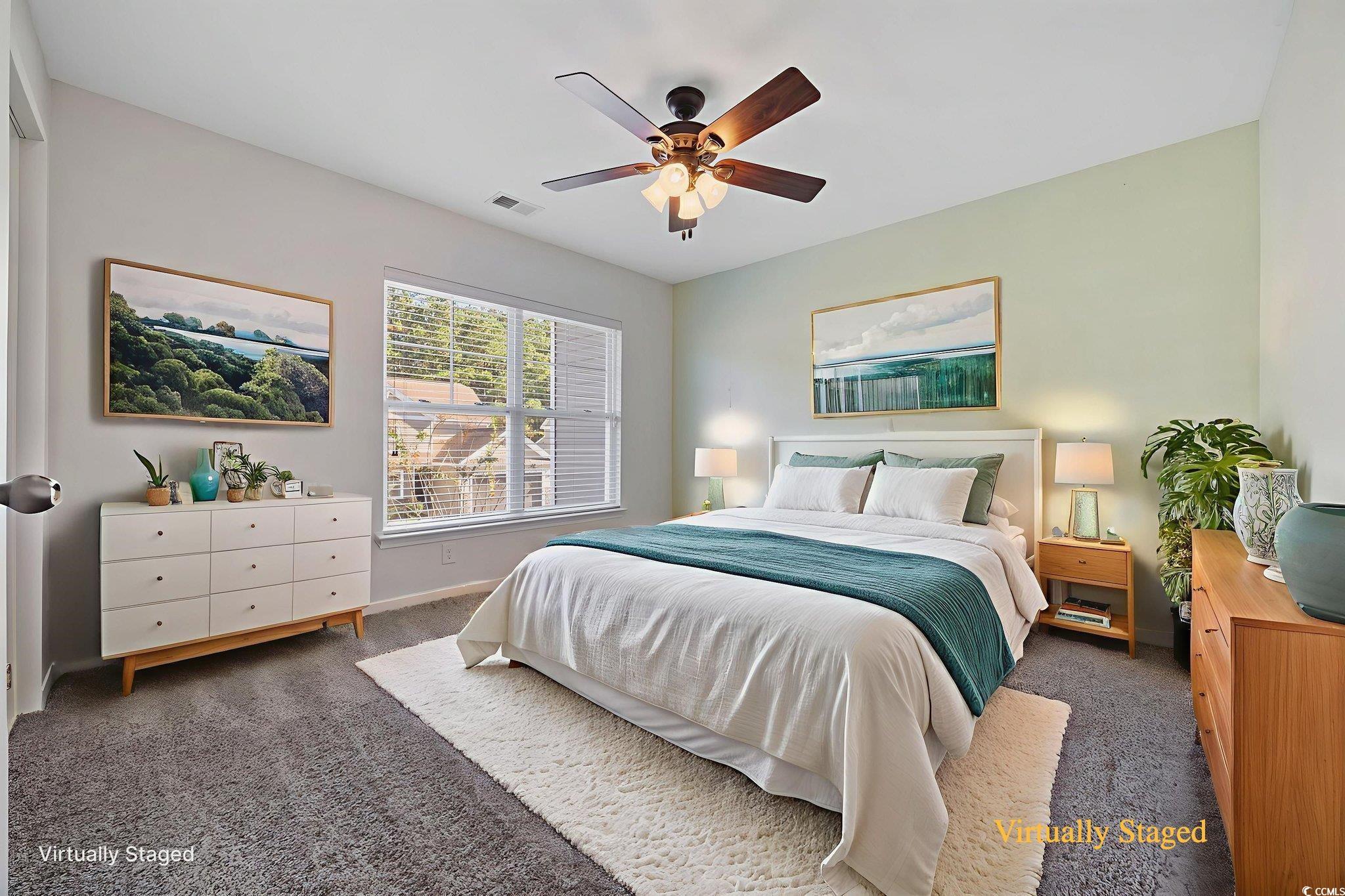 115 Machrie Loop, Unit D Myrtle Beach, SC 29588 - Photo 27 of 40 Carpeted bedroom featuring a ceiling fan and baseboards