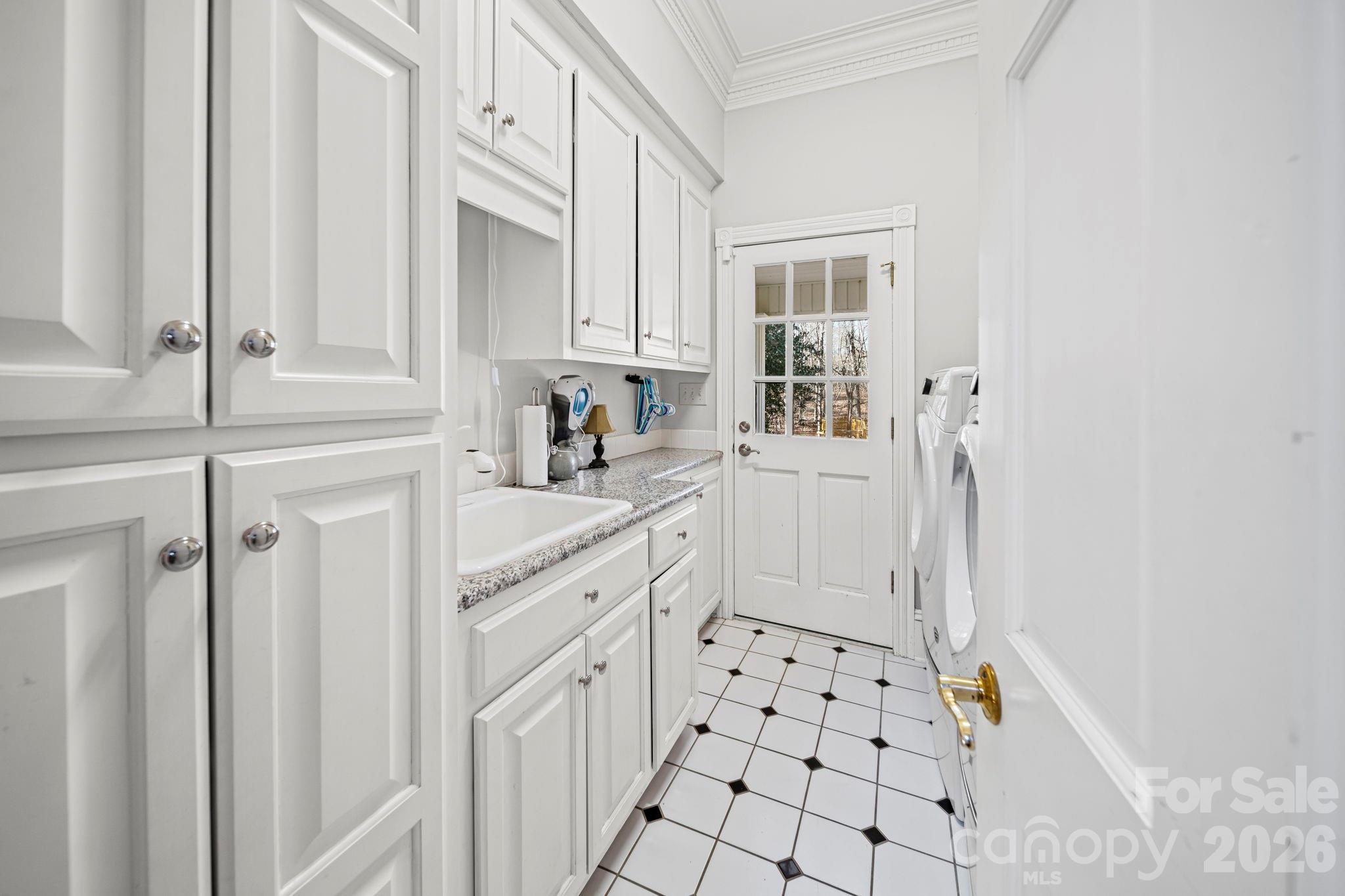 32618 Guard Road Albemarle, NC 28001 - Photo 19 of 48 a bathroom with a sink a toilet and shower