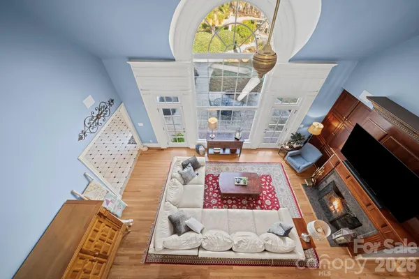 a bedroom with a bed and a fireplace