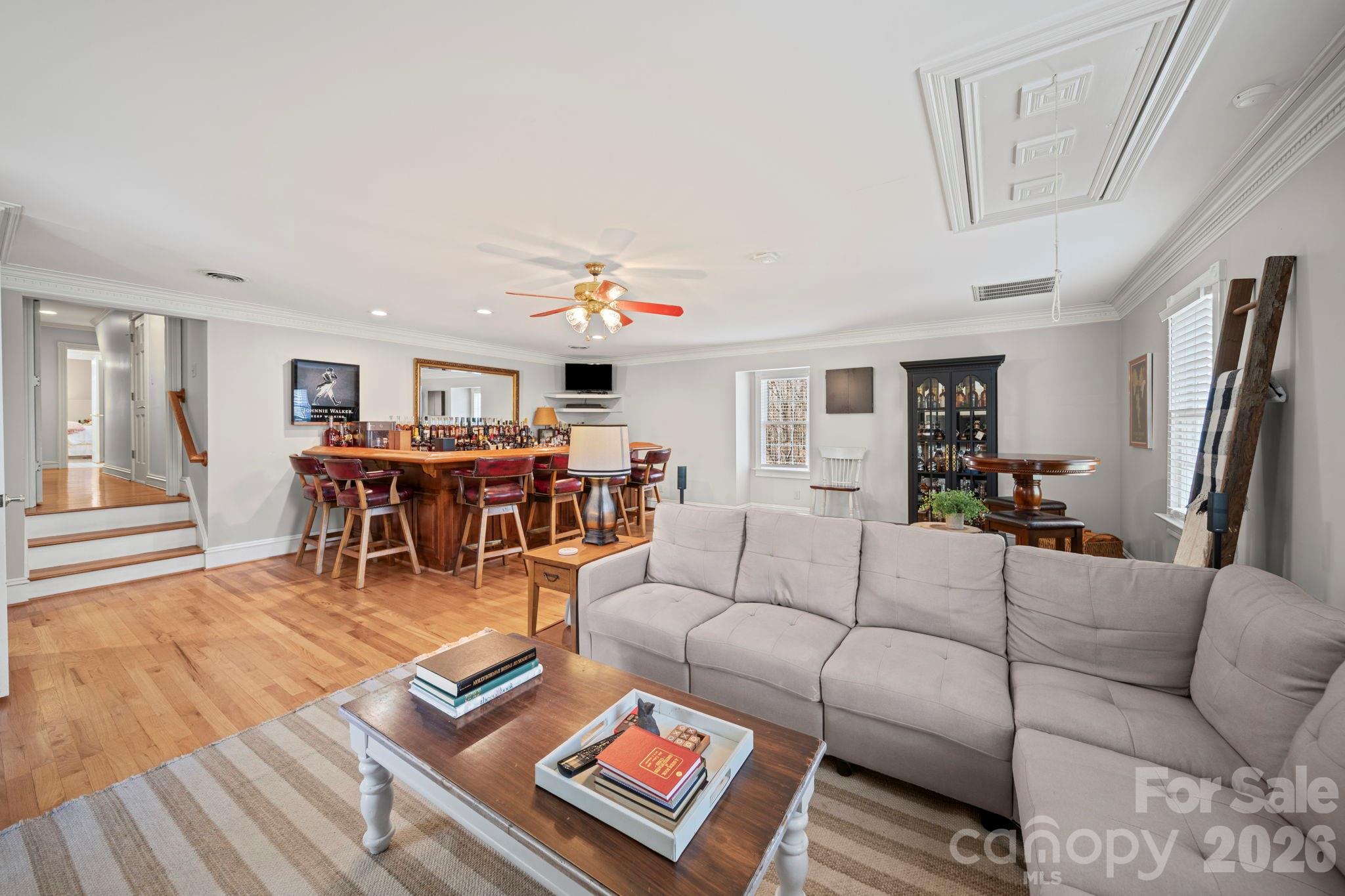 32618 Guard Road Albemarle, NC 28001 - Photo 42 of 48 a living room with furniture and wooden floor