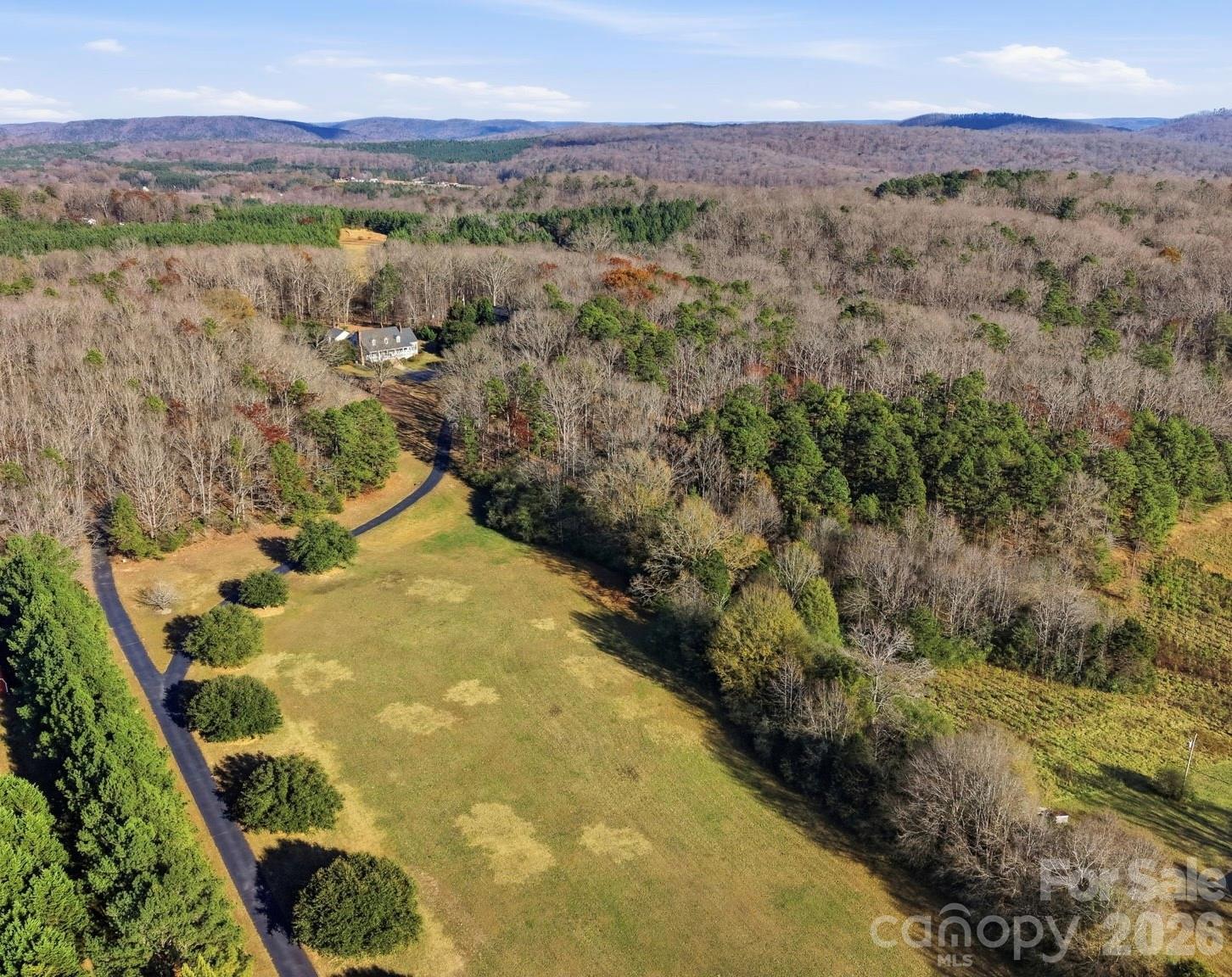 32618 Guard Road Albemarle, NC 28001 - Photo 43 of 48 a view of a yard with mountains in the background
