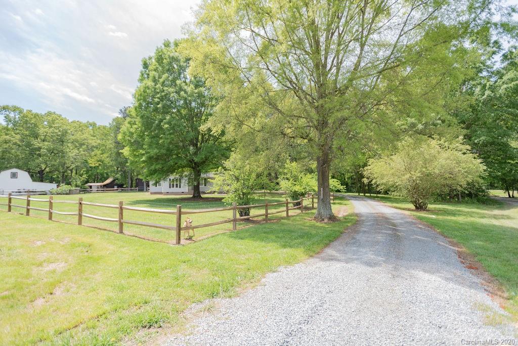 2519 Old Camden Road Monroe, NC 28110 - Photo 2 of 42 a view of a park with large trees