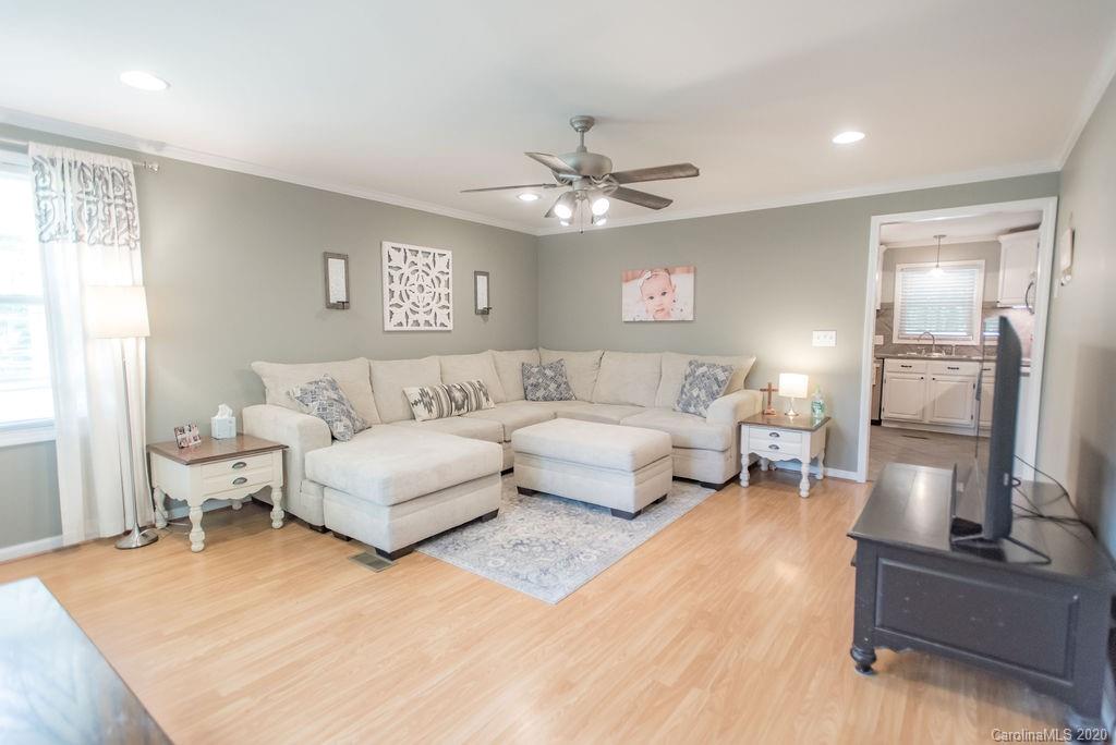 2519 Old Camden Road Monroe, NC 28110 - Photo 14 of 42 a living room with furniture and a large window