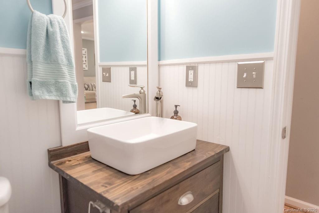 2519 Old Camden Road Monroe, NC 28110 - Photo 23 of 42 a white bath tub sitting next to a white sink