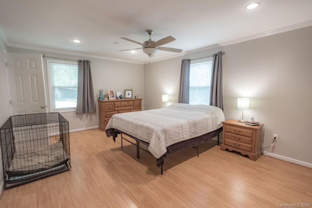 2519 Old Camden Road Monroe, NC 28110 - Photo 24 of 42 a bedroom with a bed and window