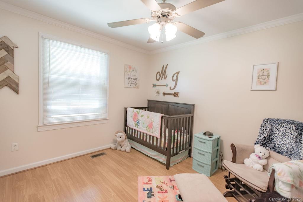 2519 Old Camden Road Monroe, NC 28110 - Photo 27 of 42 a bedroom with furniture and a window