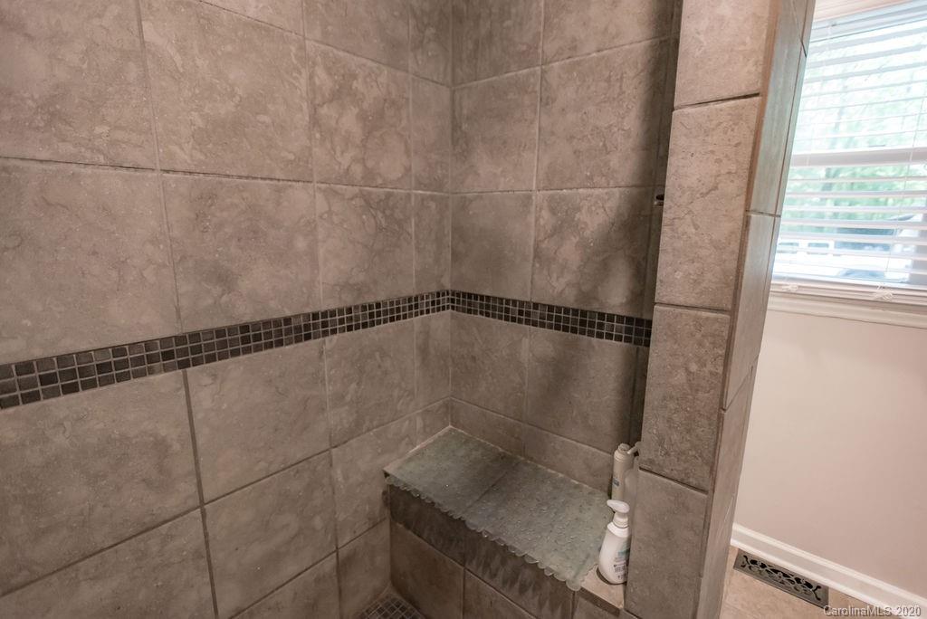 2519 Old Camden Road Monroe, NC 28110 - Photo 28 of 42 a bathroom with a shower