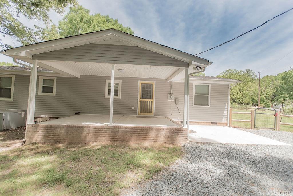 2519 Old Camden Road Monroe, NC 28110 - Photo 35 of 42 front view of a house with a yard