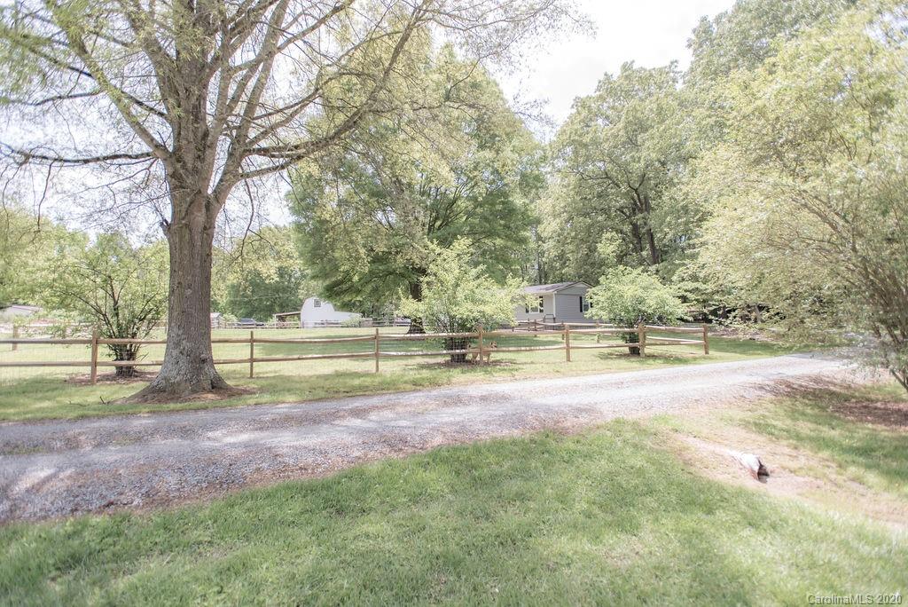 2519 Old Camden Road Monroe, NC 28110 - Photo 38 of 42 a view of yard with tree