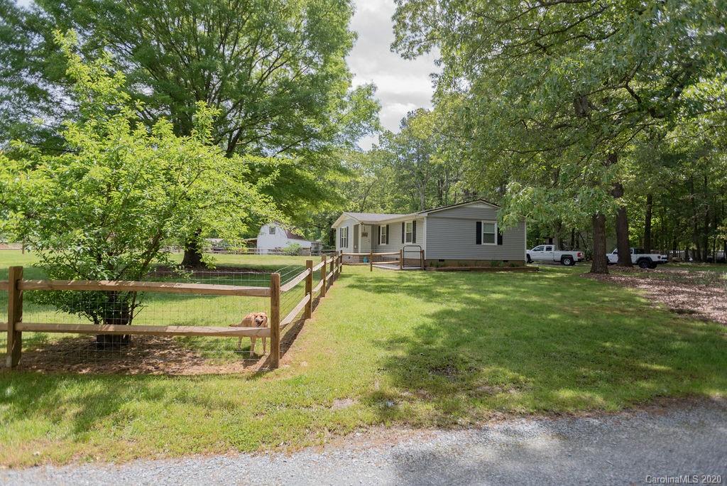 2519 Old Camden Road Monroe, NC 28110 - Photo 42 of 42 a view of a house with a yard