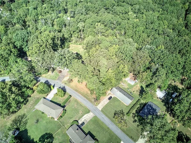 an aerial view of residential house with outdoor space