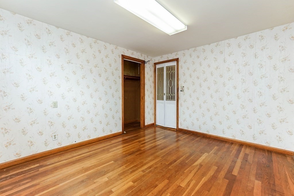 4 Pico Avenue Winthrop, MA 02152 - Photo 25 of 42 a view of an empty room with wooden floor
