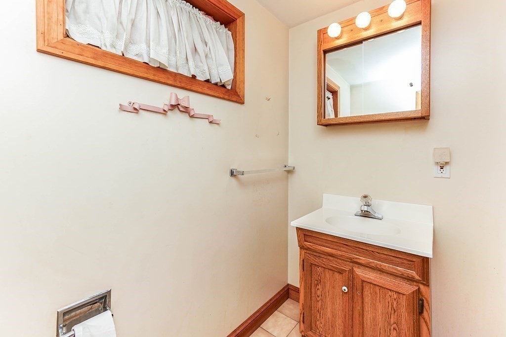 4 Pico Avenue Winthrop, MA 02152 - Photo 32 of 42 a bathroom with a shower and a sink