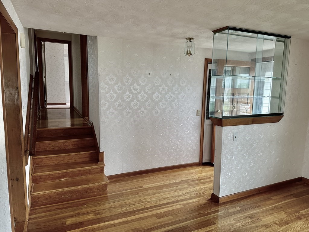 4 Pico Avenue Winthrop, MA 02152 - Photo 5 of 42 a view of a room with wooden floor and windows