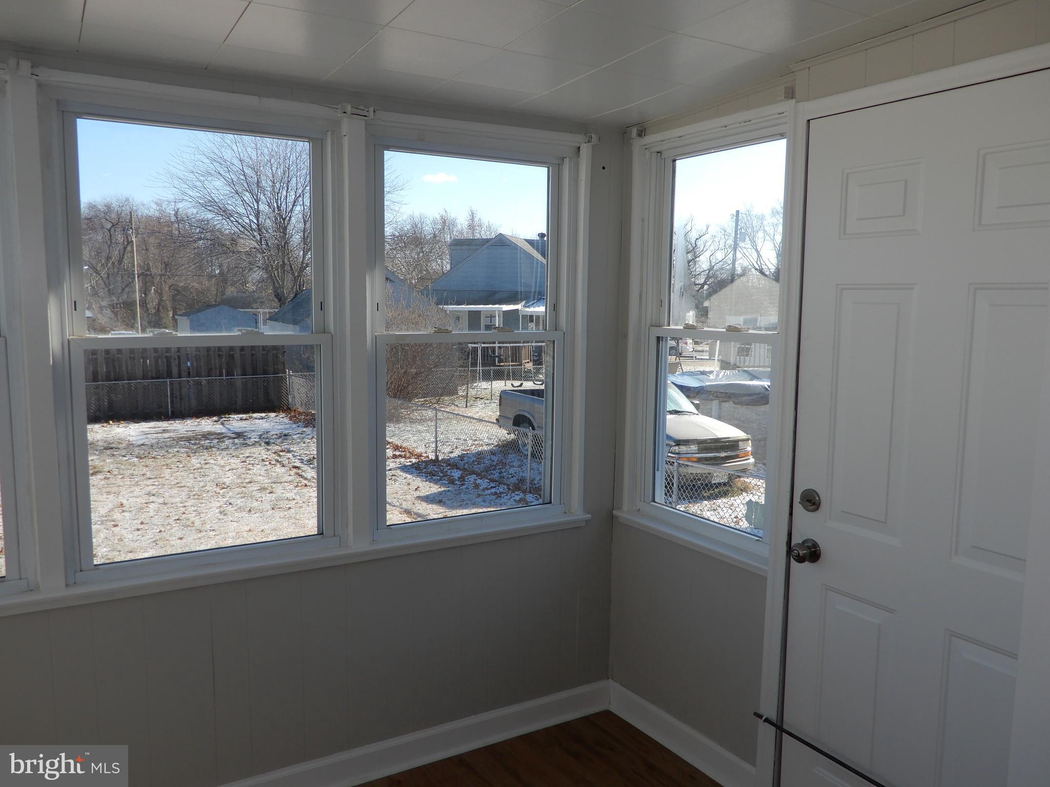 7606 Poplar Road Baltimore, MD 21222 - Photo 10 of 18 a view of a small space with a window